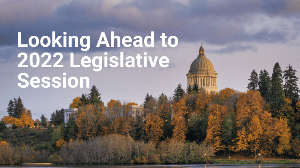 Capitol Building Above Capitol Lake in Olympia WA - photo by John Callery via Canva. Text reads Looking Ahead to 2022 Legislative Session